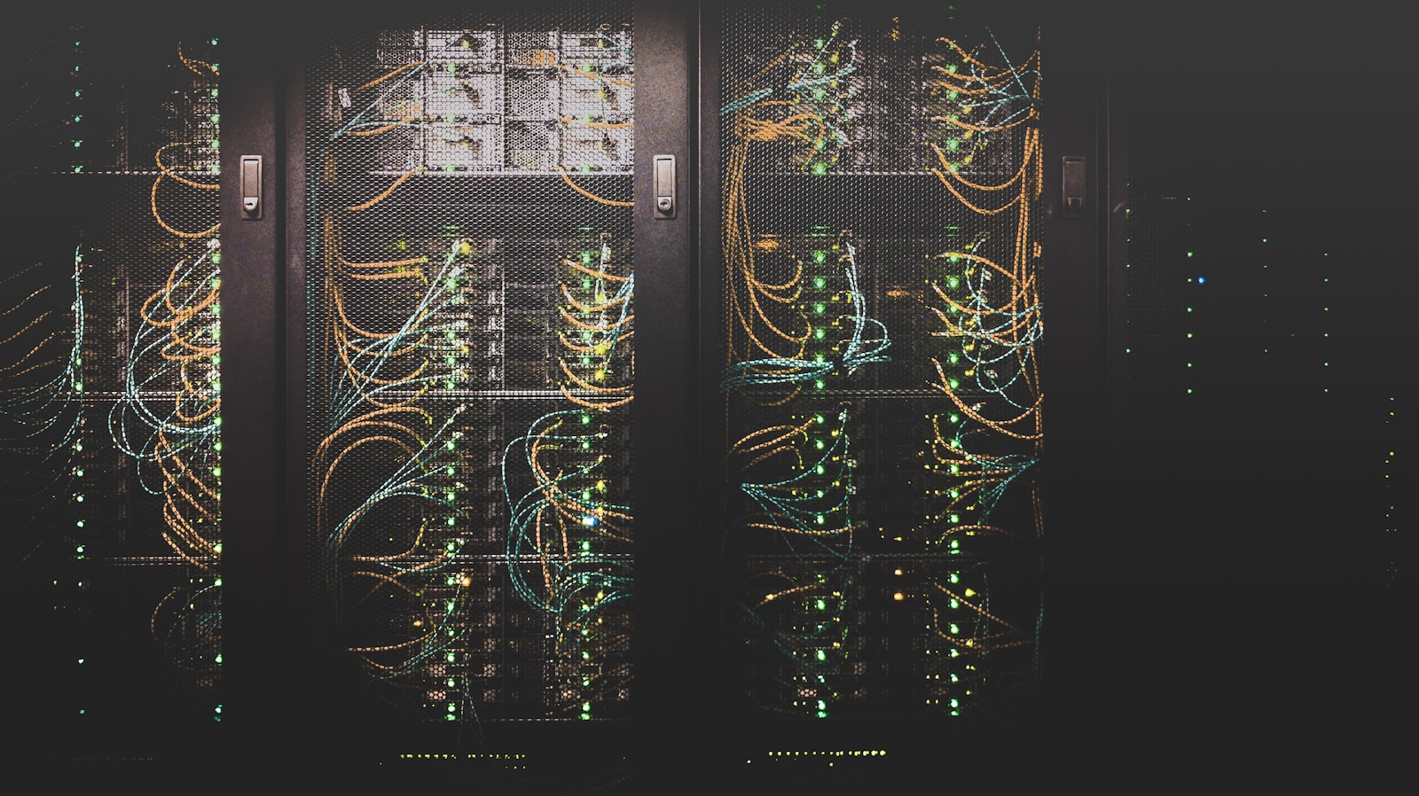 Server room aisle with cool lighting